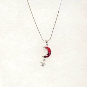 Bundle 3 for $45. Red moon and star necklace